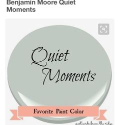 a button with the words quiet moments painted on it