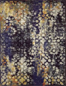 an area rug with various colors and patterns on it, including blue, yellow, orange, and white