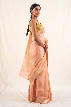 Peach silk banarasi saree with anari buttas and faint gold geometric border. Comes with an unstitched blouse piece. - Aza Fashions Fitted Slub Silk Saree With Resham Embroidery, Fitted Slub Silk Pre-draped Saree With Zari Work, Fitted Slub Silk Saree With Self Design, Fitted Cotton Silk Traditional Wear With Zari Weaving, Fitted Traditional Wear With Zari Weaving In Cotton Silk, Fitted Traditional Cotton Silk Wear With Zari Weaving, Fitted Raw Silk Saree For Puja, Fitted Pre-draped Tussar Silk Saree With Cutdana, Fitted Slub Silk Saree For Festive Occasions