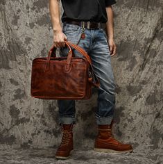 Handmade Distressed Full Grain Leather Men Briefcase Laptop Bag Handbag We use selected full grain vegetable tanned leather, quality hardware and cotton fabric to make the bag as good as it is. This bag is perfect as your everyday bag, which can fit for a 14''-16'' Laptop, an IPAD, A4 files, books, magazines, as well as many accessories. Features: • Long Adjustable Shoulder Strap • Solid Quality Hardware • Cotton Lining • Inside laptop sleeve, zipper pocket, cell pocekt, purse pocket, pen slots •Dimensions: 16.5" L x 11.8"H x 6.2"W inches (42 cm x 30 cm x 16 cm) •Color:Vintage Brown Men's Briefcase, Pocket Camera, Leather Briefcase Men, Cowhide Bag, Briefcase For Men, Vegan Leather Bag, Handbag Straps, Bag Dress, Vegetable Tanned Leather