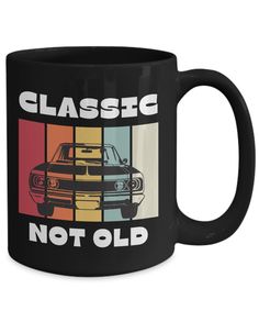 a black coffee mug with the words classic not old in front of an image of a car