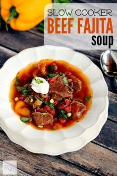 slow cooker beef fajita soup in a white bowl on a wooden table