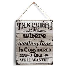 a sign that says the porch is where waiting time is considered as time well wasted