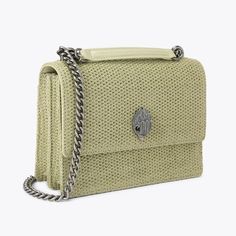 The Shoreditch Cross Body is crafted from a pale green fabric with weave effect. The front flap is topped with antiqued silver eagle head with all over feather texture on the front flap.6.2in (H), 8.2in (L), 3.1in (D)Strap drop cross body: 44.8inStrap drop shoulder: 25.9inAntiqued silver chain strap with padded leather insertsDuo magnetic snap closure hidden under flapSilver foil embossed logo on the frontExterior flat pocket on the backCan fit phones up to 7 inchesInterior divided into two main Feather Texture, Fabric Cross, Micro Bags, Silver Eagle, Silver Eagles, Eagle Head, Blue Bow, Pumps Flat, Kurt Geiger