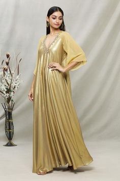 Shop for Kommal Sood Gold Georgette Sequin Embellished Tunic for Women Online at Aza Fashions Gold Embellished Designer Dresses, Designer Embellished Gold Dress, Designer Gold Embellished Dress, V-neck Dress With Mirror Work For Reception, Gold Embellished Evening Kaftan, Designer Sequined V-neck Dress, Glamorous Designer Dresses For Eid, Glamorous Embellished Kaftan For Festive Occasions, Tunics Online