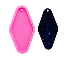 two tags with blue and pink glitter on them, one in the shape of a rectangle