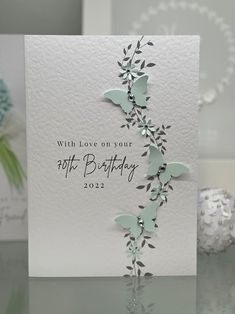 a greeting card with butterflies on it