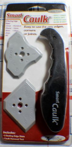 two small pieces of metal with holes in the middle and one piece missing from it