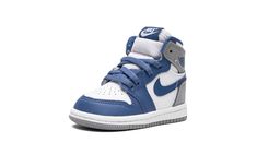 The Air Jordan 1 High OG TD “True Blue” is the toddler sizing of Michael Jordan’s first signature shoe nicknamed after an original Air Jordan colorway.  The shoe in question is the Air Jordan 3 “True Blue” that debuted in 1988.  While the Jordan 1 and Jordan 3 “True Blue” colorways differ in design, both feature an appealing shade of blue accenting on their appearance.  Here, the Jordan 1 “True Blue” features a white leather base with True Blue leather overlays on the toe cap, forefoot, eyelets,