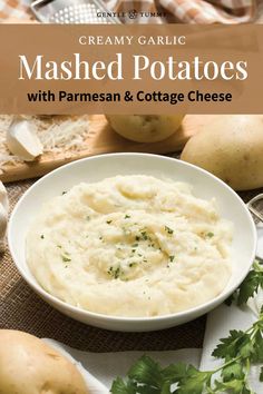 mashed potatoes with parmesan and cottage cheese in a bowl on a table