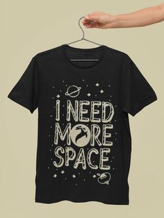 "🌠 \"I Need More Space\" T-Shirt - A Humorous Take on the Cosmos! Superior Quality: Made from 100% Airlume Combed Cotton, this Bella Canvas 3001 T-shirt ensures both comfort and durability. Fit for All: Available in true-to-size, pre-shrunk variants, making it a perfect choice for every space enthusiast, regardless of gender. Unique Design: The witty \"I Need More Space\" statement makes this T-shirt ideal for those who appreciate space and humor. Eco-Friendly Production: Proudly printed in the Funny Astronaut, I Need More Space, Space Enthusiast, Space Tshirt, Galaxy Shirt, I Need Space, Need More Space, Planet Design, I Need More