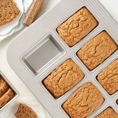 several muffins in a pan on a table