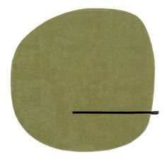 an oval shaped rug with a black line on the middle and one end at the top