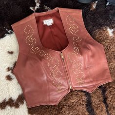 Excellent Used Condition (Euc) Kippy’s Brand Leather Vest Authentic Luxe Leather Gorgeous Rhinestones And Studs Handcrafted In The Usa One Of A Kind Only Worn Once For A Horse Show Gorgeous Brown Leather With Golden Chocolate Rhinestones And Brass Studs Golden Chocolate, Horse Show, Leather Vest, A Horse, Brown Gold, Brown Leather, Jackets & Coats, Jackets For Women, Brass