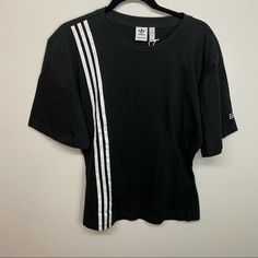 Black Tshirt White Adidas Stripes Down The Front 1/2 Length Oversized Sleeves Shirt Tapers At The Waistline For More Flattering Shape New With Tags Size Medium Care Instructions Pictured Oversized Sleeves, Oversize Sleeves, Adidas Tops, Adidas Black, White Adidas, Black Adidas, White Tshirt, Adidas Women, Shirt Sleeves