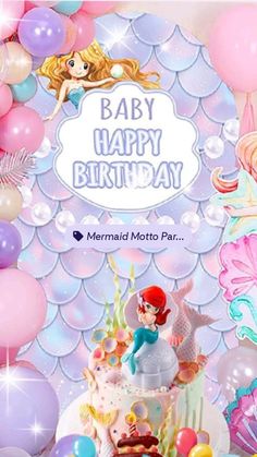 a mermaid themed birthday cake surrounded by balloons