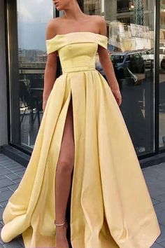 Welcome to our store.This dress could be custom made.there are no extra cost to do custom size and color.Service email: service@winkbridal.com. Item Detail: 1. Silhouette: A Line2. Hem-length:Floor Length3. Fabric:Satin4. Neckline:Off The Shoulder5. Sleeve: Off The Shoulder6. Embellishment:Slit7. Back Details:Zipper8. Lining:Boned And Fully Lined 9. Build-in Bra: Yes10. Size: Standard Size or Custom Size11. Picture Color:Light Blue/Yellow/Pink/Champagne(For custom color,please check our color ch Yellow Prom Dresses Long, Long Elegant Prom Dresses, Yellow Formal Dress, Yellow Prom, Split Prom Dresses, Prom Dresses Yellow, Elegant Prom Dresses, Rock Punk, Satin Prom Dress