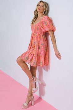 The Darling Daze Woven Mini Dress is crafted with eye-catching prints and premium fabrics. With a U neckline and short puff sleeves, it boasts a flattering fit. The smocked bodice and tiered skirt offer a graceful silhouette, making this dress the perfect choice for special occasions. Details Self: 100% Polyester Lining: 100% Polyester Size & Fit - Model is 5`8" And Wearing Size Small - Measurements Taken From Size Small - Approx. Length: 34” Pink Knee-length Puff Sleeve Ruched Dress, Pink Puff Sleeve Mini Dress With Smocked Back, Pink Mini Dress With Puff Sleeves And Smocked Back, Pink Mini Puff Sleeve Dress With Ruched Detail, Pink Ruched Puff Sleeve Mini Dress, Feminine Short Sleeve Mini Dress With Smocked Bodice, Feminine Short Sleeve Smocked Bodice Mini Dress, Pink Short Sleeve Dress With Smocked Back, Pink Ruched Short Sleeve Dress