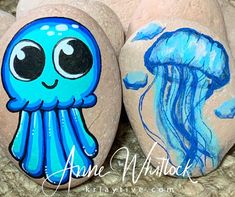 two painted rocks with jellyfishs on them