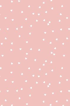 a pink background with white hearts on it