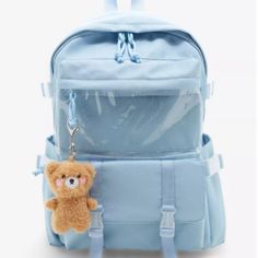 Authentic Brand New With Tag Unused. Ship With Care,Photos Taken From Actual Item. Note: Brand New. Lua Pastel Blue Bear Plush Backpack Keep Your School Bag Simple And Cute With This Pastel Blue Backpack! It Comes With A Plush Bear Key Chain, And A Clear Front Zipper Pocket. Below Is A Pocket With A Hidden Zipper And Transparent Buckle Straps For Secuity. There Are Side Pockets With Adjustable Buckle Straps For Tightening. Interior Comes With A Laptop Sleeve And More Drop Pockets. 11" X 4 1/2" X Blue Backpack Shoulder Bag For School, Blue Standard Backpack Shoulder Bag For School, Light Blue Large Capacity Backpack, Large Capacity Light Blue Backpack, Casual Blue Student Backpack, Casual Light Blue Backpack, Blue Backpack For Students, Trendy Blue Rectangular Backpack, Trendy Light Blue Backpack