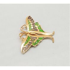 This is part of Chairish’s Costume Jewelry assortment.  Goldtone light and dark green enamel butterfly brooch with security clasp. Marked "Napier." Measures: 2 1/8 inches long by 2 3/4 inches wide. Condition: Very good; perhaps the slightest of surface wear to the goldtone. A blue and green enamel version of this brooch was featured in a c1971 advertisement. I also have a yellow and orange version of this pin as well as one of the other butterflies from the same advertisement.  Please reference Green Enamel Brooch Pin As Gift, Formal Green Enamel Brooches, Green Enamel Pin Brooch For Gift, Green Brooch Enamel Pin For Gift, Green Butterfly Brooch Jewelry, Elegant Green Enamel Pin, Elegant Green Enamel Pin Gift, Elegant Green Enamel Pin For Gift, Gold Butterfly Brooches For Collectors