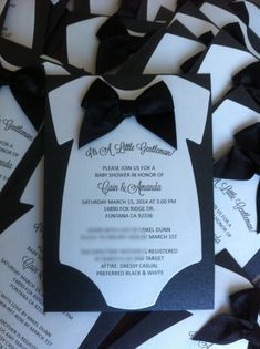 black and white wedding stationery with bow ties