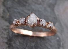 a close up of a ring on a rock