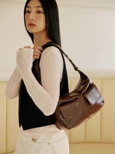 It is a daily bag brand that can be used comfortably every day.- Practical design with two out pockets- Open and close with the hidden magnet- Can be worn as a shoulder bag or a cross bag- Vintage and natural mood Chic Brown Bag With Pockets, Chic Brown Bags With Pockets, Chic Brown Shoulder Bag With Pockets, Brown On-the-go Shoulder Bag With Pockets, Everyday Baguette Bag With Pockets, Versatile Brown Baguette Bag For Everyday, Versatile Everyday Brown Saddle Bag, Versatile Brown Saddle Bag For Daily Use, Everyday Baguette Shoulder Bag With Pockets