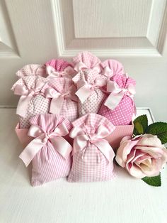 pink and white polka dot gift bags with roses