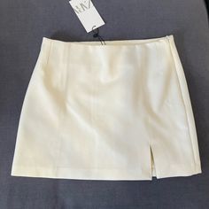 Cream Mini Skirt From Zara, Size M, Brand New Tags Still Attached. Elegant Zara Mini Skirt Lined, Fitted Zara Skort In Solid Color, Zara High-waist Lined Skirt, Zara High Waist Lined Skirt, Elegant Zara Lined Skort, Elegant Zara Skort For Summer, Elegant High-waist Skort By Zara, Zara Mini Skort In Solid Color, Zara High Waist White Mini Skirt