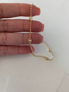 14K Gold Puffed Mariner Anklet Bracelet, 5MM Wide, Real 14K Gold Anklet, Gold Ankle Bracelet, Women Ankle Jewelry, Puffed Mariner Anklet, 5MM Mariner Style Gold Anklet, Shiny Finish, Mariner Anklet, Thick Gold Anklet, Light weight ♦ Materials: 14K Solid Gold♦ Available colors: Gold ♦ Anklet measurements: 10" in length, 5MM Wide Mariner Links, 2MM Wide Rolo Chain♦ Weight measurements: 3.9 grPRODUCTION TIMESOrder processing time varies between 1-2 business days, we work on our pieces dailyAll orde Elegant Yellow Gold Chain Anklets, Anklet Gold, Ankle Jewelry, Gold Anklet, Bracelet Women, Ankle Bracelet, Ankle Bones, Anklet Bracelet, Rolo Chain