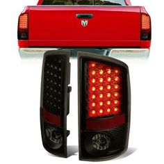 the tail lights of a red pickup truck