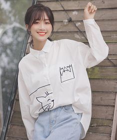 A classic white shirt with a cute cat drawing twist White Long Sleeve Top With Cat Design, White Cotton Shirt With Cat Design, White Relaxed Fit Top With Cat Design, White Relaxed Fit Top With Cat Print, White Casual Shirt With Cat Print, Korean Blouses, Korean Shirts, Korean Blouse, Cat White