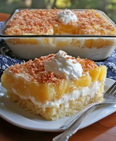 two pieces of cake sitting on top of a white plate