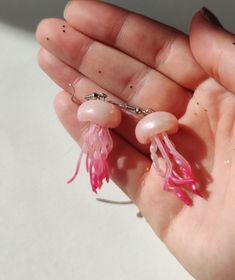 This Pink Jellyfish Earrings will be the perfect gift for an ocean lover. It has a shimmering pastel pink shade and was designed to make a statement. If you are searching for a Jellyfish Gift, then you have came to the right place! D E T A I L S: * Handmade Pink Jellyfish Dangle Earrings * Made from Polymer Clay * Drop Length: 2 inches (5 cm) * Color: Clear white and shimmering pink * Ear wire: Stainless steel * Earrings are light and easy to wear * Earrings arrive nicely packed in a eco friendl Ocean-inspired Drop Earrings For Gifts, Ocean-inspired Drop Earrings Gift, Ocean-inspired Drop Earrings For Gift, White Fish Hook Earrings As Gift, Handmade Pink Ocean-inspired Jewelry, Handmade Ocean-inspired Pink Jewelry, Jellyfish Jewelry, Jellyfish Earrings, Pink Jellyfish