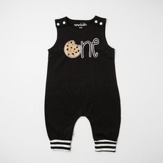 "DUE TO BUTTON SHORTAGES, BLACK ROMPERS RECIEVED WILL EITHER HAVE WHITE OR BLACK SNAP CLOSURES AT THE SHOULDERS BASED ON AVAILABLE STOCK Nom, nom! It's time to celebrate your little monster in this darling cookie themed first birthday romper! Great for a cookie themed 1st birthday. You can choose to add a your child's name to the romper to truly personalize your kiddos 1st birthday bash! * Available in 12month and 18 month sizes. * Black Romper with black and white cuffs that hit just beneath th Cookie 1st Birthday, Cookie Monster Outfit, Monster Outfit, Birthday Romper, Cookies And Milk, 1st Birthday Outfit, 1st Birthday Outfits, Sons Birthday, Chocolate Chip Cookie