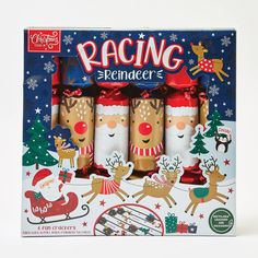 three christmas candles with reindeers and santa's sleigh