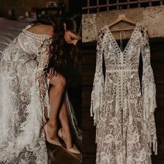 two women in white dresses standing next to each other and looking at the dress on display