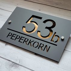 a metal sign that reads 53b peperkorn on it