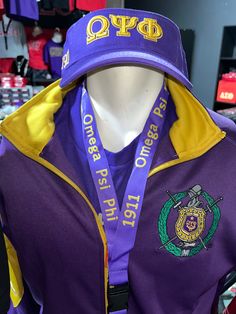 a purple and yellow hat on display in a store