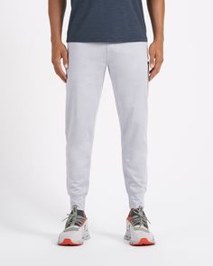 A fresh take on athleisure and a staple in your wardrobe, the Sunday Performance Joggers are premier in fit, function and soft stretch. This jogger style will keep you moving with less bulk around your ankles. | Vuori Sunday Performance Jogger Pants | Platinum Heather | XXL Vuori makes premium performance apparel inspired by the active Coastal California lifestyle; an integration of fitness, surf, sport, and art. Breaking down the boundaries of traditional activewear, we are a new perspective on Sportswear Bottoms With 4-way Stretch, 4-way Stretch Sportswear Joggers With Side Pockets, Athleisure Stretch Sweatpants With Go-dry, Stretch Go-dry Sweatpants In Athleisure Style, Stretch Go-dry Sweatpants For Athleisure, Sportswear 4-way Stretch Joggers With Side Pockets, Sporty 4-way Stretch Sweatpants With Side Pockets, Sportswear Comfort Stretch Go-dry Pants, Sporty Joggers With Side Pockets And Comfort Stretch