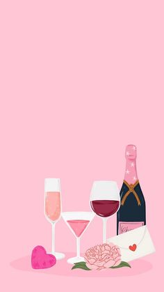 two wine glasses and a bottle on a pink background