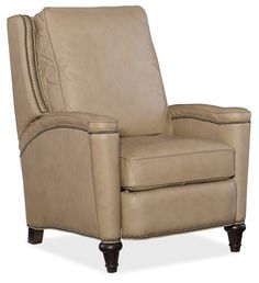 a beige leather recliner chair with nail trimmings on the arms and legs