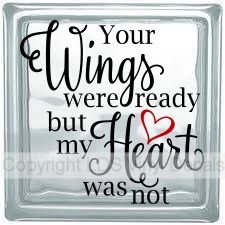 a glass block with the words, your wings were already but my heart was not