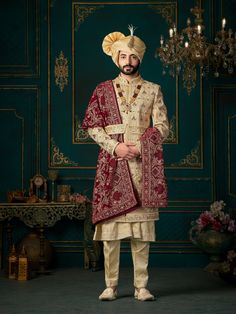 Step into elegance and tradition with our Royal Golden Sherwani, a stunning choice for the discerning groom. This designer sherwani blends classic charm with contemporary style, perfect for a memorable wedding day look. Handcrafted with meticulous attention to detail, this sherwani features intricate embroidery and exquisite embellishments, making it a standout piece for any groom. Elevate your wedding attire with this magnificent sherwani, tailored to perfection for a truly regal appearance on Orang India, Portraits Painting, Sherwani For Men Wedding, Wedding Kurta, Groom Dress Men, Wedding Outfits For Groom, Indian Groom Wear, Wedding Dresses Men Indian