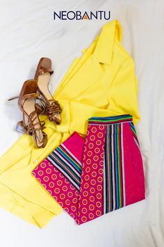 Winter outfits don’t have to be plain. Add bright colors to your business casual wardrobe. Pair our vibrant pink pencil skirt with a yellow blazer and you can sport this combo any month of the year. For winter, complement it with knee-length boots and a fashionable coat. Wear this fun mix to anything from work to a Christmas party - it's a sure hit! Discover more African fashion from NeoBantu! Knee Length Boots