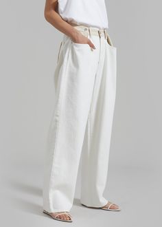 Color: Off White/Beige Midweight cotton denim Relaxed fit Wide leg High rise Contrast denim waist detailing Adjustable button waistband Slant hip pockets Back patch pockets Front button closure Zip fly Unlined 100% Cotton Dry Clean or Hand Wash Cold Imported