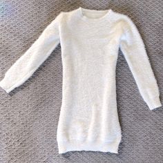 Cozy Sweater Dress In The Softest, Fuzziest Stretchy Fabric. Perfect For Colder Days. Body-Conforming Style Yet Highly Comfortable And Lightweight. Size Xs/S (Fits Both - High Stretch). Perfect Condition, Never Worn! White Crew Neck Sweater Dress For Winter, Cozy Crew Neck Winter Dresses, Cozy Mini Dress For Winter, Cozy Long Sleeve White Dress, Cozy Winter Mini Dress, Cozy White Long Sleeve Dress, Cozy Long Sleeve Soft Knit Dress, Cozy Soft Knit Long Sleeve Dress, Cozy Fitted Mini Dress For Winter