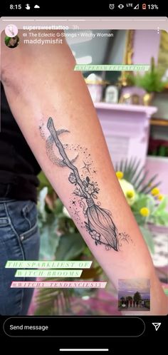 a woman's arm with a tattoo on it and an arrow in the middle